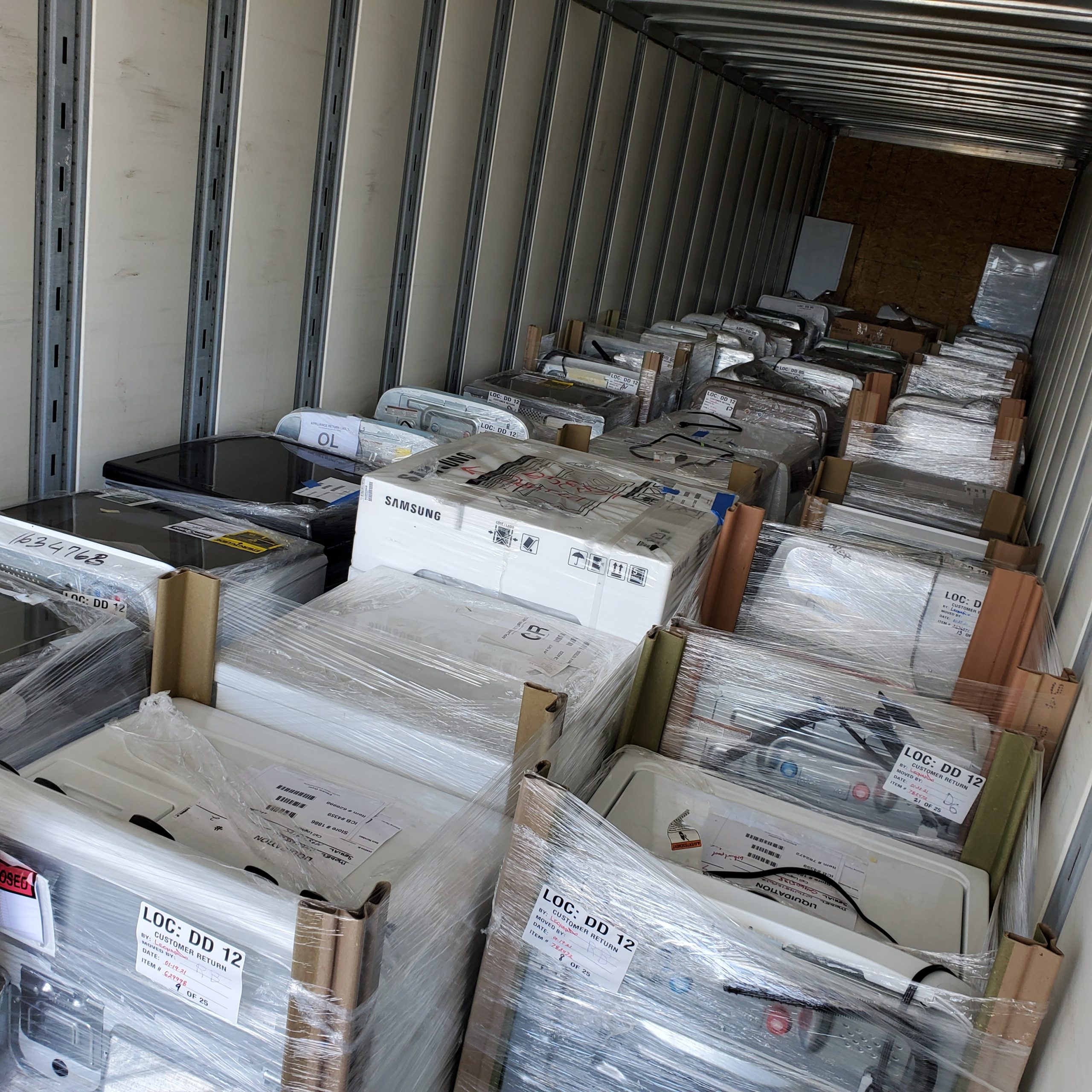picture of Truckload of wholesale liquidation appliances from Best Buy.