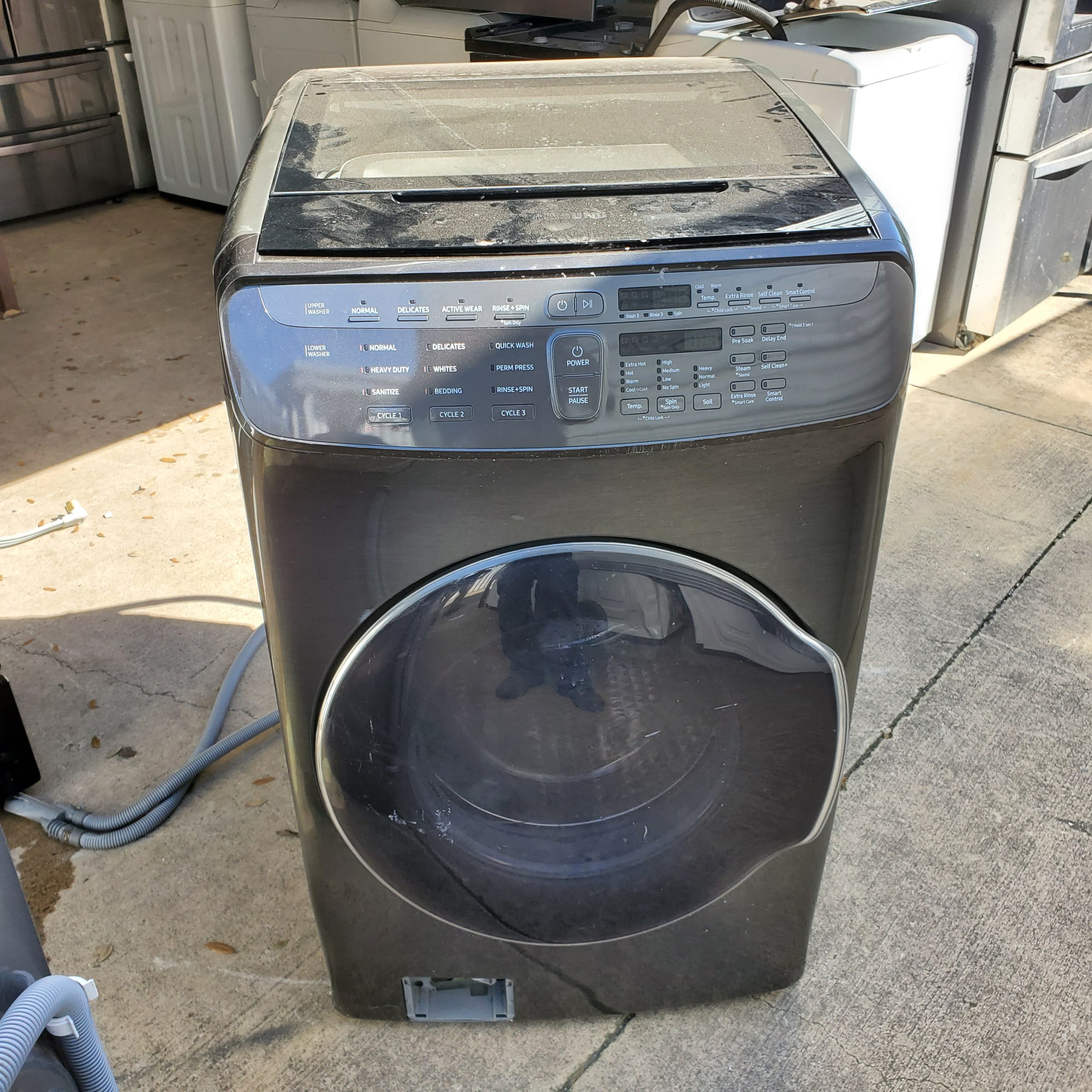 example pictures of Another High end Front load Samsung Washing Machine from our Salvage appliance program.