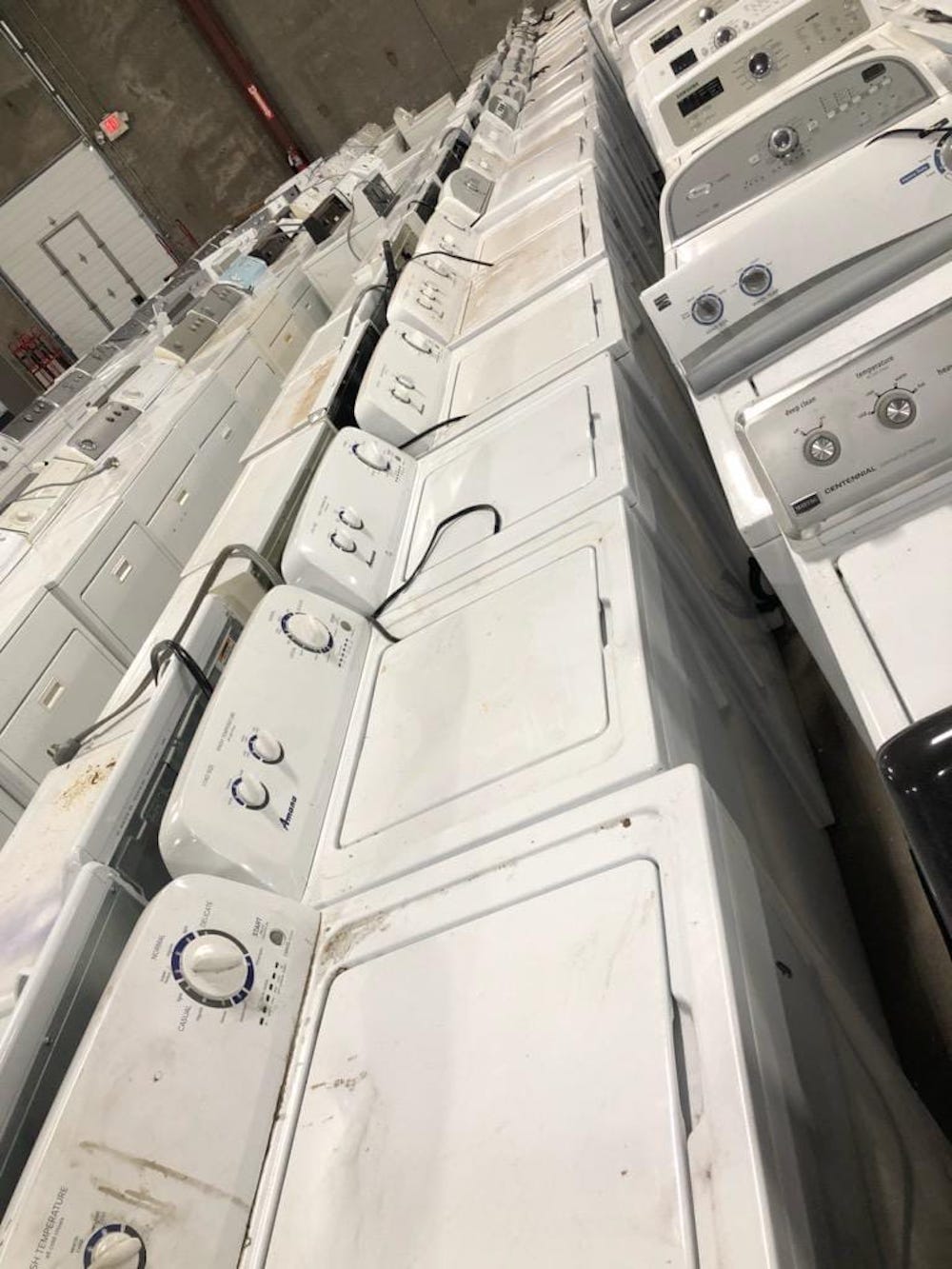 example pictures of Our wholesale members gain access to buy Haul away appliances like these used washers and dryers.