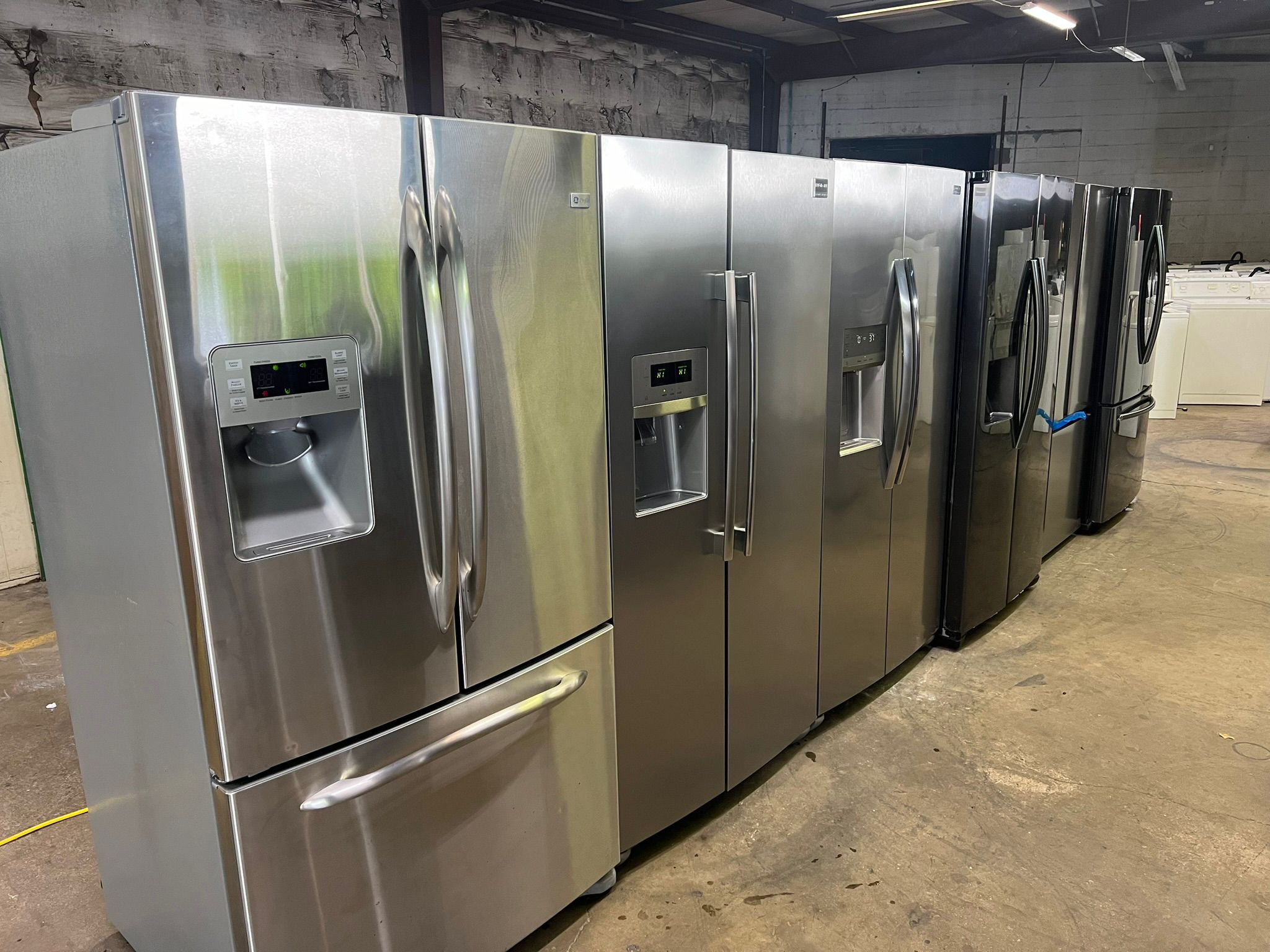 A stainless steel french door refrigerator representing the top-bottom category