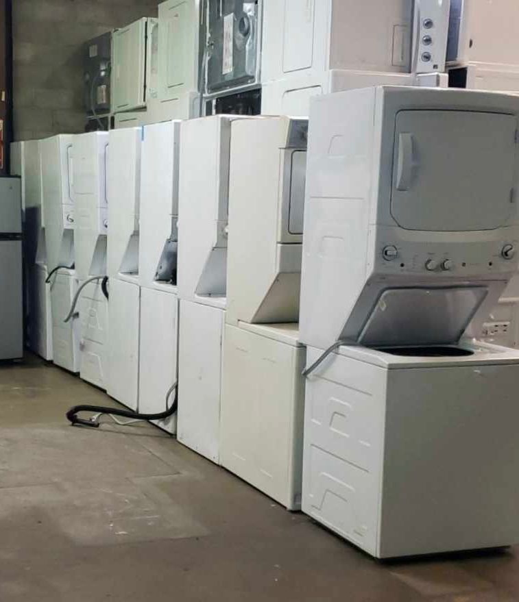 A white electric stacked laundry center